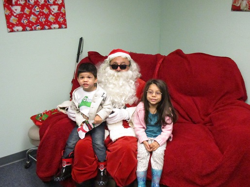 Blind Santa and two children